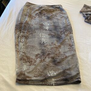 Pretty little thing. Gray oriental printed mesh long sleeved  bodysuit size 12.